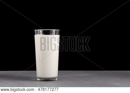 Ayran, Kefir In Tall Glass On Black Background. Fermented Milk Ayran. Milk Diet For Weight Loss.