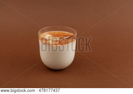 Glass Of Salep Drink On Brown Background. Selective Focus, Copy Space. Salep, Also Spelled Sahlep Or