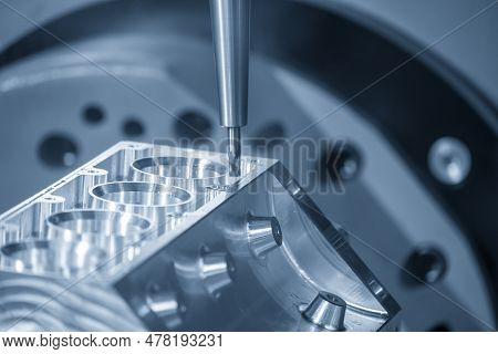 Close Up Scene The 5-axis Machining Center Cutting The V8 Engine Cylinder Block With Solid Ball End 
