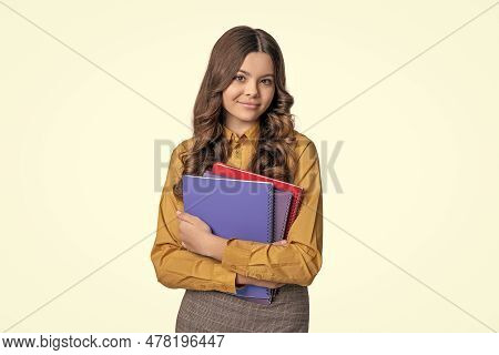 Glad School Student Girl On Background. Photo Of School Student Girl With Homework.