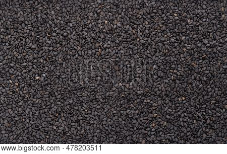 Black Sesame, From Above. Unhulled Seeds Of Sesamum Indicum, With Rich And Nutty Flavor, And With On