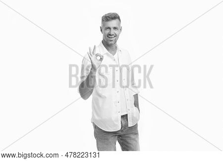Studio Shot Of Grizzled Guy Show Ok. Mature Grizzled Guy Isolated On White Background.
