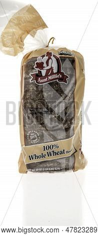 Winneconne, Wi - 25 June 2023: A Package Of Aunt Nillies Whole Wheat Bread On An Isolated Background