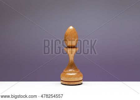 White Chess Piece Bishop, Officer Or Elephant. Old Wooden Chessman For Play The Game Of Chess. Bisho