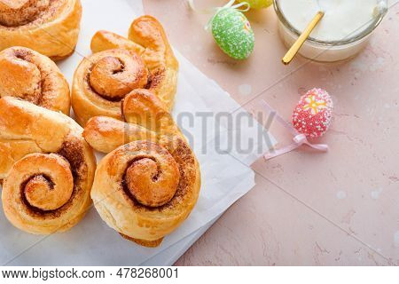 Easter Breakfast Holliday Concept. Easter Bunny Buns Rolls With Cinnamon Made From Yeast Dough With 