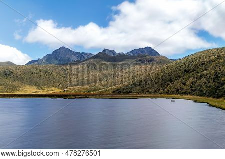 Ruminahui Volcano In The Background With The Limpiopungo Lagoon In The Foreground, On A Beautiful Su