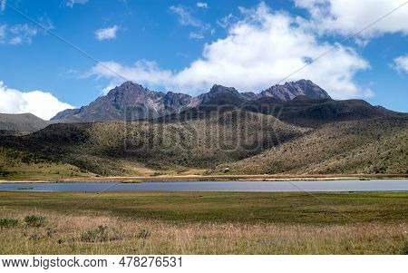 Ruminahui Volcano In The Background With The Limpiopungo Lagoon In The Foreground, On A Beautiful Su