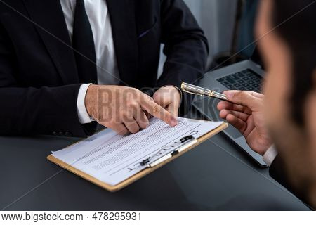 Closeup Business Deal Meeting, Businessman Carefully Reviewing Terms And Condition Of Contract Agree
