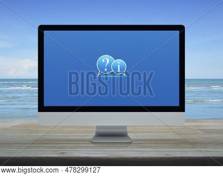 Question Mark And Information Chat Icon On Desktop Modern Computer Monitor Screen On Wooden Table Ov