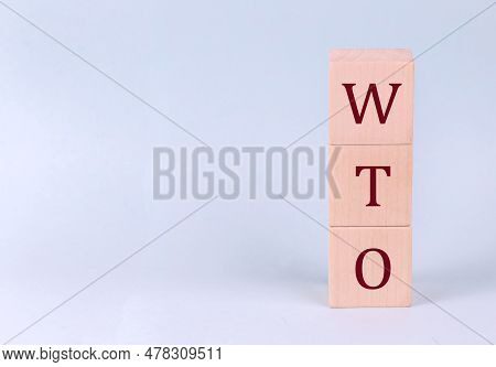 Wto On A Wooden Cubes On A Blue Background