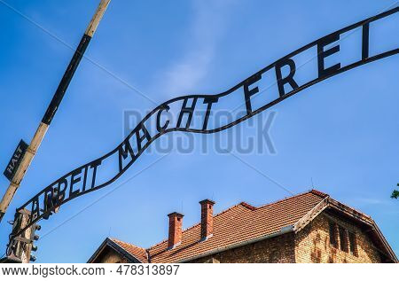 Oswiecim, Poland - May 12, 2016: Gate Entrance To Concentration Camp Auschwitz With A Sign Arbeit Ma