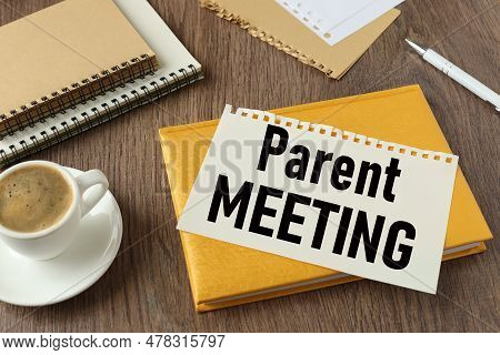 Parent Meeting Beautiful Yellow Notepad On The Work Table. Text On The Page