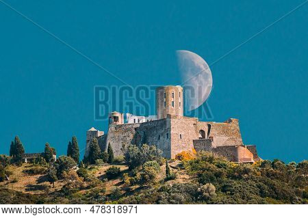Collioure, France. Moon Moonrise Above Fort Saint Elme In Sunny Spring Day. Old Medieval Fortress Sa