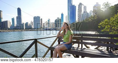 Fashion Girl Enjoying Balneario Camboriu City Architecture. Travel In Brazil. Banner With Copy Space