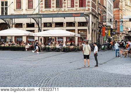 Leuven, Flemish Brabant, Belgium, July 23, 2023 - Bars And Terraces At The Old Market Square With St