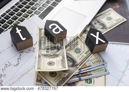 Tax Text On Wooden Cubes. Tax Business Concept .