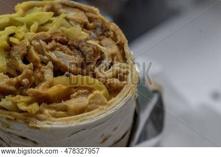 Israeli Traditional Homemade Chicken Shawarma. Fast Food Concept Image.