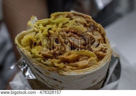 Israeli Traditional Homemade Chicken Shawarma. Fast Food Concept Image.