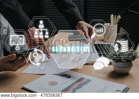 Remarketing Concept, Business Team Analyzing Income Charts And Graphs On Office Desk With Remarketin