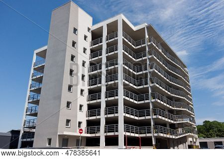 Large Multi-level Parking Against The Blue Sky.