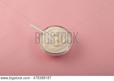 Xanthan Gum Powder In Glass Dish With Measuring Spoon. Food Additive E415. Binding Agent, Thicken, I