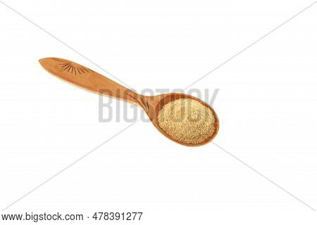 Fenugreek Flour Or Hulbah Powder In Wooden Spoon On White Background. Selective Focus, Copy Space. H
