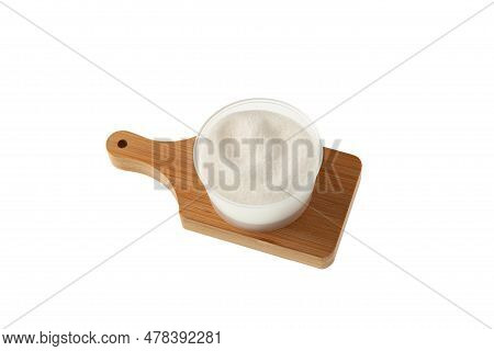 Konjac Gum Powder In Plastic Bowl On Wooden Board. Food Additives E425. Konjac Gum Is Used Along Wit