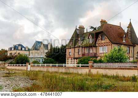 Sunrise View Of Coastal Street Of Grandcamp Maisy, A Scenic French Coastal Town In Normandy, With Fi