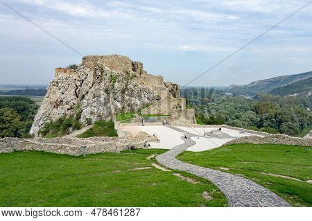 Devin, Slovakia - September 7, 2012: Ruins Of Devin Castle Near Bratislava, Slovakia With Tourists