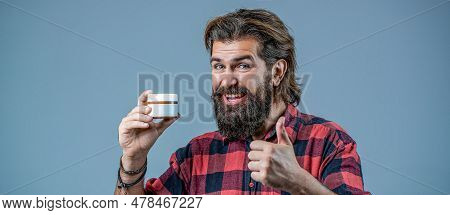 Bearded Man With Cream In His Hands Shows A Thumbs Up. Cream Conditioner For Men. Expert Care For De
