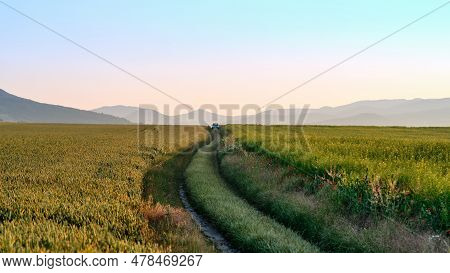 Green-blue Car Parked Offroad In Scenic Nature With View Of Central Bohemian Highlands (czech: České