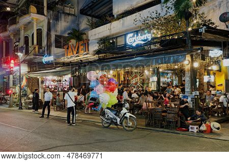 Hue, Vietnam - March 21, 2023: The Atmosphere In Front The Bar And Restaurant Which Is Full Of Custo