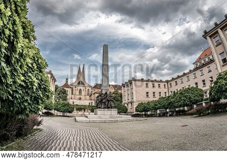 Palacky Square, Czechoslovak Legion Monument And Emmaus Monastery On The Background. Prague, Czech R