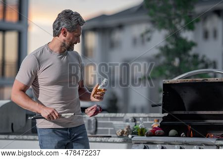 Grill Cook. Chef With Bbq Cooking Tools. Barbecue And Grill. Picnic And Barbecue Party. Chief Cook W