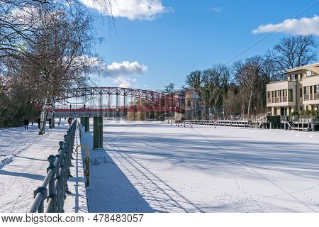 Berlin, Germany - February 12, 2021: Frozen Stream Tegeler Fliess With Its Heritage-protected Steel 