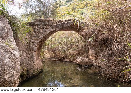 Remains Of An Old Ruined Abandoned Bridge In The Nahal Amud National Natural Park In Western Galilee