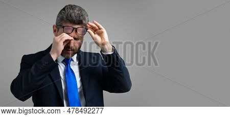 Tired, Headache And Eye Strain. Business Man In Suit With Stress, Burnout And Fatigue Eyestrain. Chr