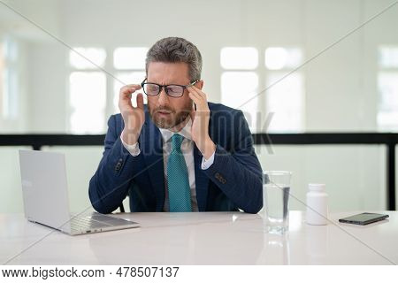 Head Pain Concept. Cephalalgia And Migraine. Man With Sinus Headache, Tension Or Cluster Headache. H