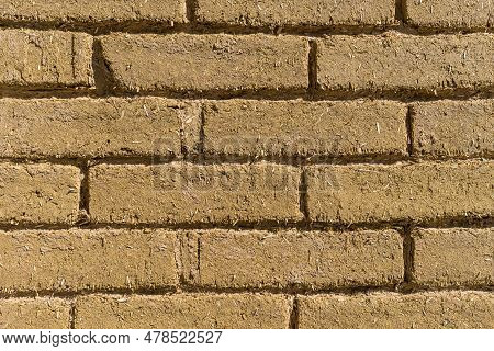 The Brick From Clay And Straw, Is Laid Out On All Background, Clay Bricks For Building Clay House As