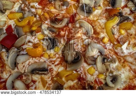 Funghi Pizza With Tomato Sauce, Cheese, Mushrooms, Peppers And Corn On Wooden Table