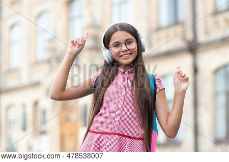 Teen Girl Has Education Online And Having Fun In Headphones. Teen Girl Has Education Online