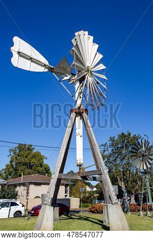 Toowoomba, Australia - May 24, 2023: Collection Of Different Windmills In Front Of The Cobb And Co M