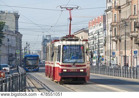 Saint Petersburg, Russia - June 27, 2023: Tram Lvs-86k Of Route No. 49 Moves Along The Dedicated Lan