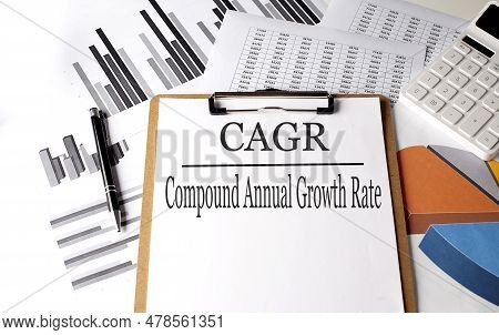 Paper On A Clipboard With Cagr On A Chart Background