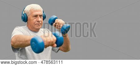 Senior Man Working Out Banner. Gray Stusio Background. Person Lifting Dumbbells. Old Male Exercising