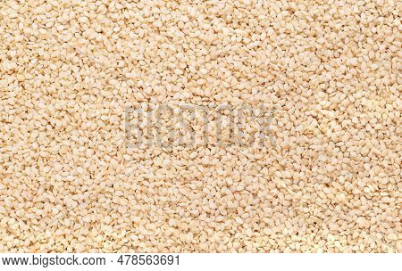 Hulled White Sesame Seeds, Surface, From Above. Sesamum Indicum, Also Called Benne. Common Ingredien