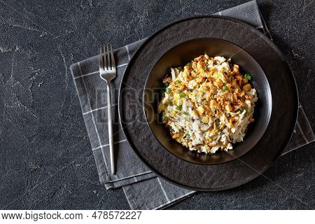 Chicken Rice Casserole D Iberville Topped With French Fried Onion And Crumbled Crackers In Black Bow
