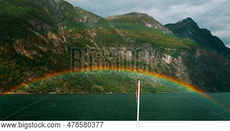Sunnylvsfjorden, Norway. Colorful Rainbow Above Sunnylvsfjorden Spring Landscape. Panorama View From