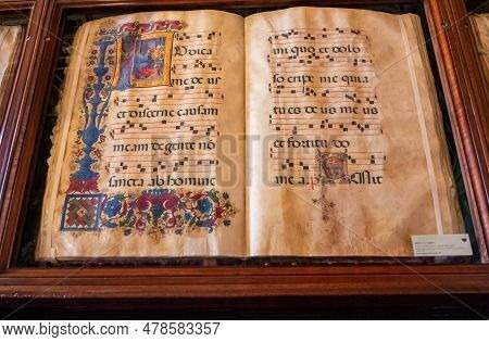 Siena, Italy 02 June 2022 Showcase With Colorful Painted Manuscript Codices At Piccolomini Library A