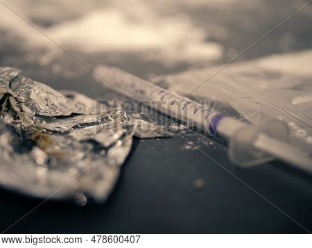 Heroin Powder Burned On Tin Foil For Injection